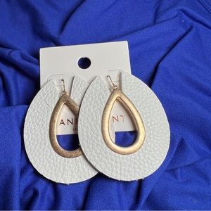White and gold statement earrings